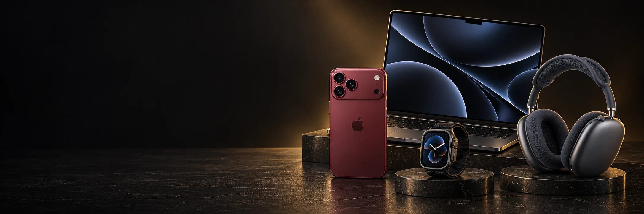 Selección ilustrativa de MacBook Pro, iPhone borgoña, Apple Watch y AirPods Max